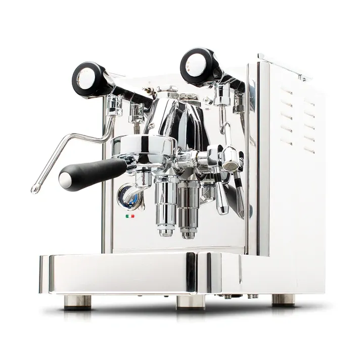 A white machine with two black handles and one handle on the side.
