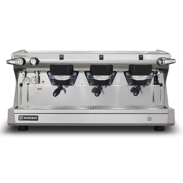 A three group espresso machine with the top front of it.