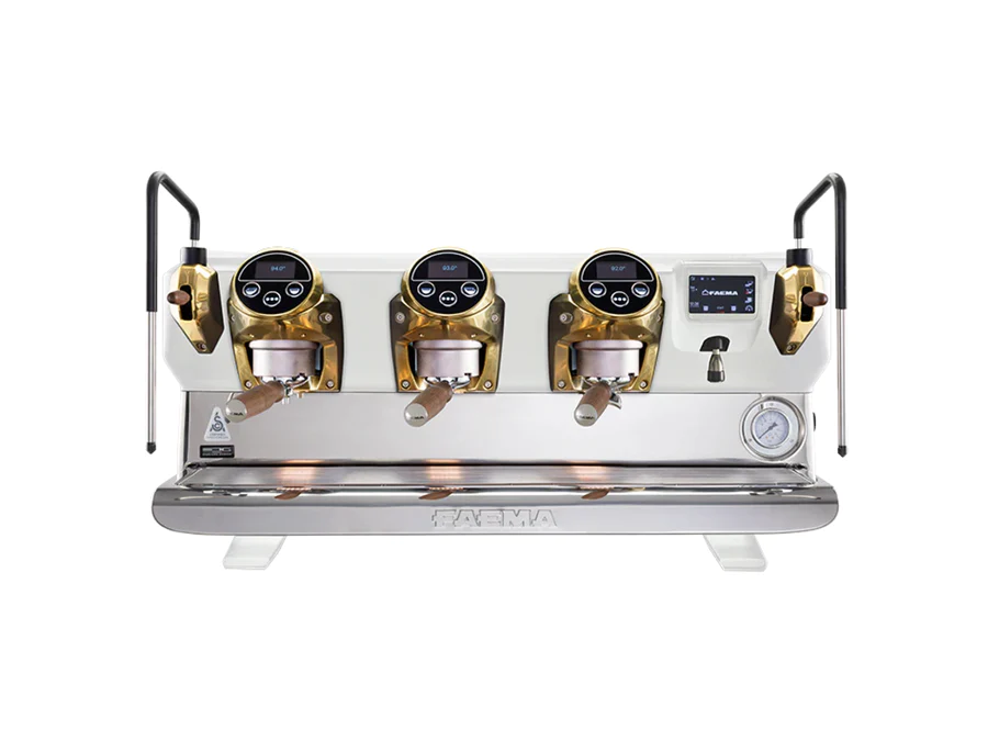 A triple group espresso machine with four brass burners.