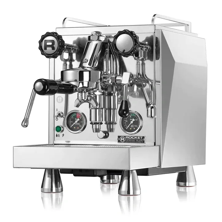 A silver machine with two different types of coffee.