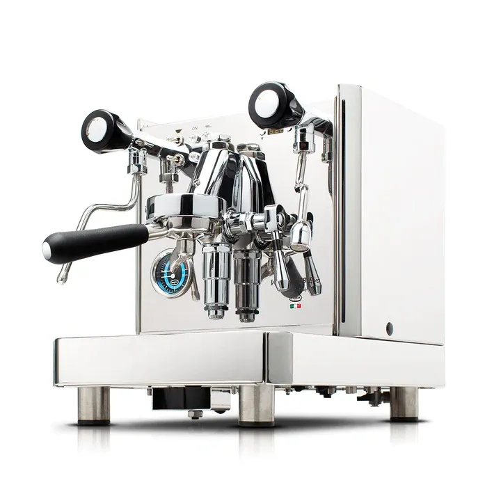 A white espresso machine with two black handles.